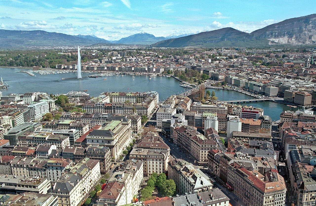 Geneva, Switzerland skyline over Lake Geneva at sunset